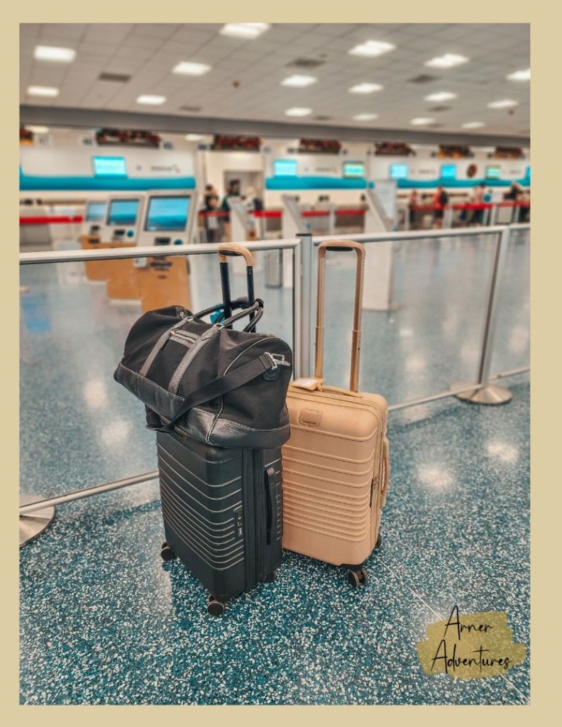 Luggage in airport by Travel Blogger, Arner Adventures